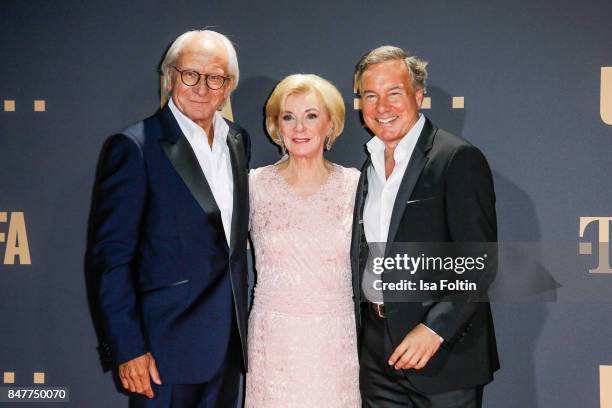 Wolf Bauer, producer and CEO UFA, Liz Mohn and Nico Hofmann, CEO UFA attend the UFA 100th anniversary celebration at Palais am Funkturm on September...