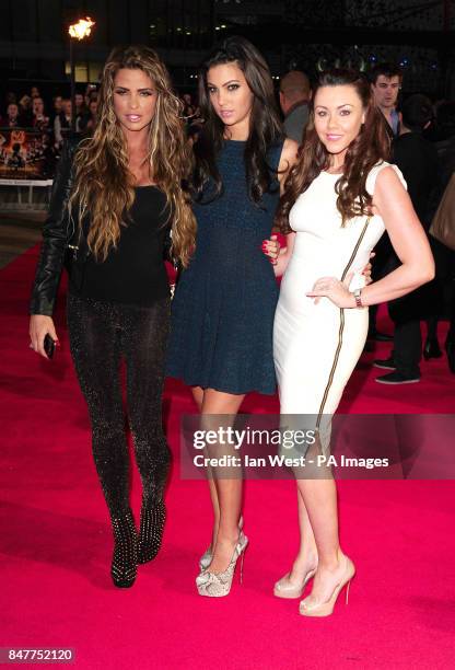 Katie Price, Ellie Jenas and Michelle Heaton arrive at the premiere of The Hunger Games at the O2 in London.