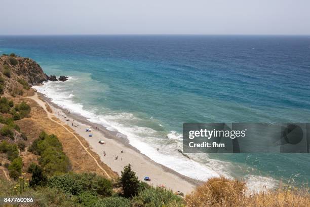 small beach at mediterranean sea (near torre del mar, malaga province, spain) - málaga province stock-fotos und bilder