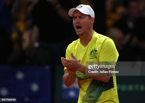 John Millman of Australia is supported by team captain Lleyton Hewitt against David Goffin of Belgium during day one of the Davis Cup World Group...