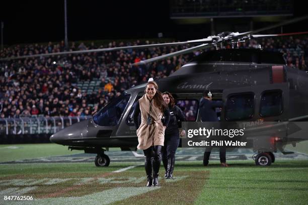 Portia Woodman of the Black Ferns arrives by helicopter before the Rugby Championship match between the New Zealand All Blacks and the South African...