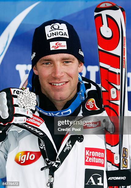 Silver medal winner Benjamin Raich of Austria celebrates following the Men's Giant Slalom event held on the Face de Bellevarde course on February 13,...