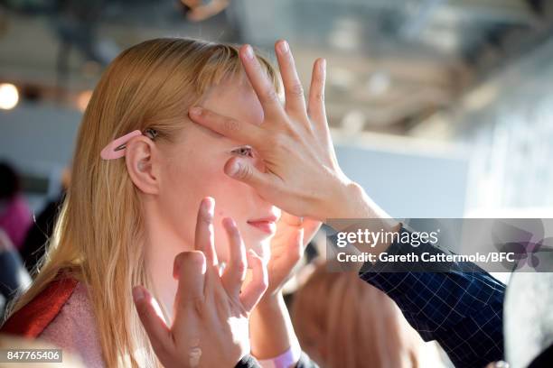 Model is seen backstage ahead of the Paula Knorr and Richard Malone shows during London Fashion Week September 2017 on