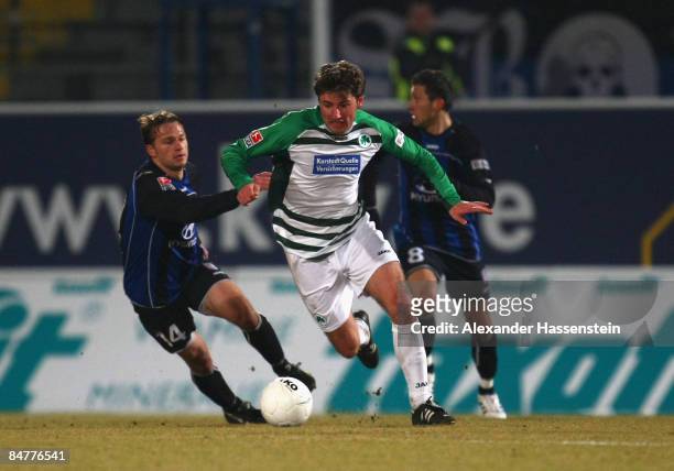 Stefan Reisinger of Fuerth battles for the ball with Lars Weissenfeldt of Frankfurt and his team mate Sead Mehic during the Second Bundesliga match...