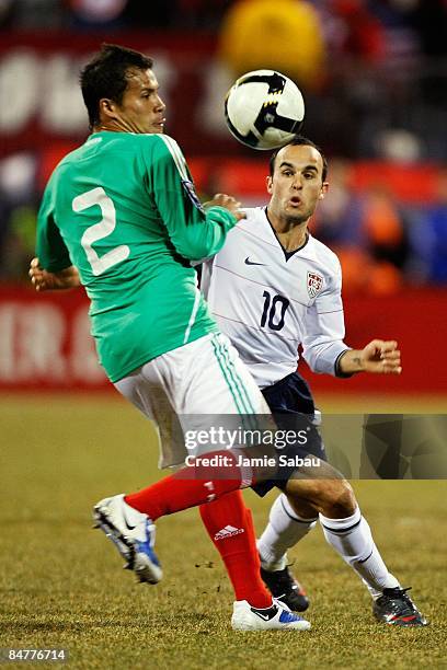 Aaron Galindo of Mexico battles for the ball against Landon Donovan of USA during a FIFA 2010 World Cup qualifying match in the CONCACAF region on...