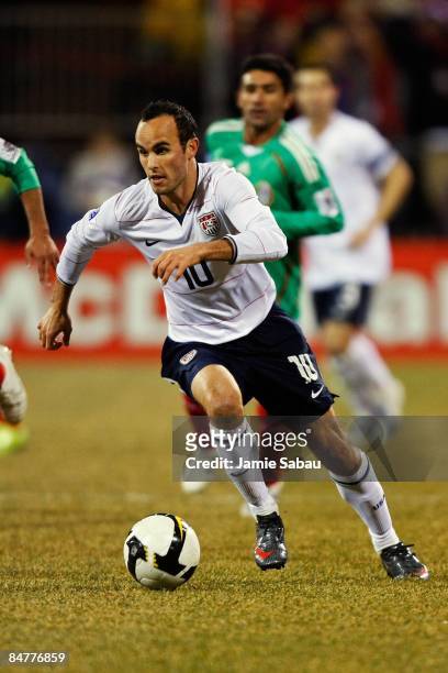 Landon Donovan of USA dribbles the ball against Mexico during a FIFA 2010 World Cup qualifying match in the CONCACAF region on February 11, 2009 at...