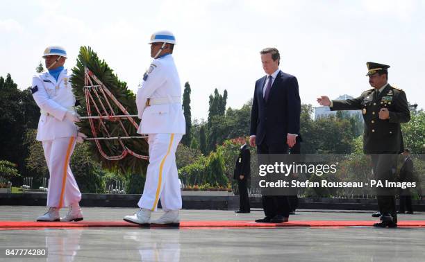 Prime Minister David Cameron lays a wreath at the Kalibata National Heroes Cemetery in Jakarta today on his arrival in Indonesia for a two day visit.