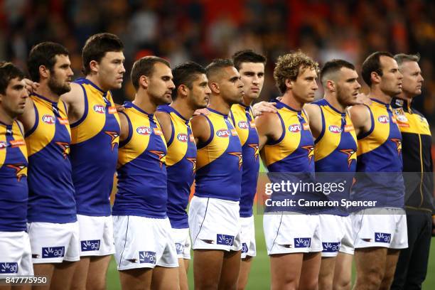 Eagles players line up for the Australian national anthem during the AFL First Semi Final match between the Greater Western Sydney Giants and the...