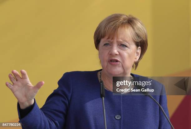 German Chancellor and Chrstian Democrat Angela Merkel speaks at an election campaign stop on the island of Ruegen on September 16, 2017 in Binz,...