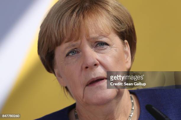 German Chancellor and Chrstian Democrat Angela Merkel speaks at an election campaign stop on the island of Ruegen on September 16, 2017 in Binz,...