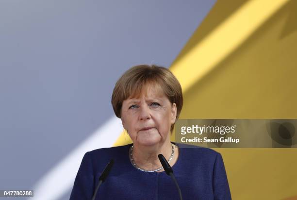 German Chancellor and Chrstian Democrat Angela Merkel speaks at an election campaign stop on the island of Ruegen on September 16, 2017 in Binz,...