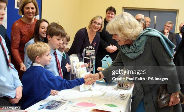 The Duchess of Cornwall meets children from the Sunday school at St George's Church in Belfast.