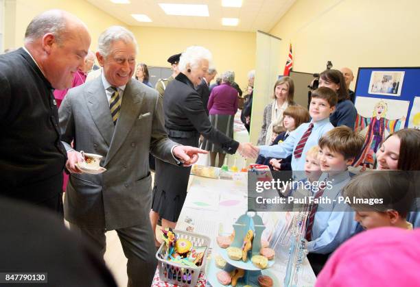 The Prince of Wales meets children from the Sunday school at St George's Church in Belfast.