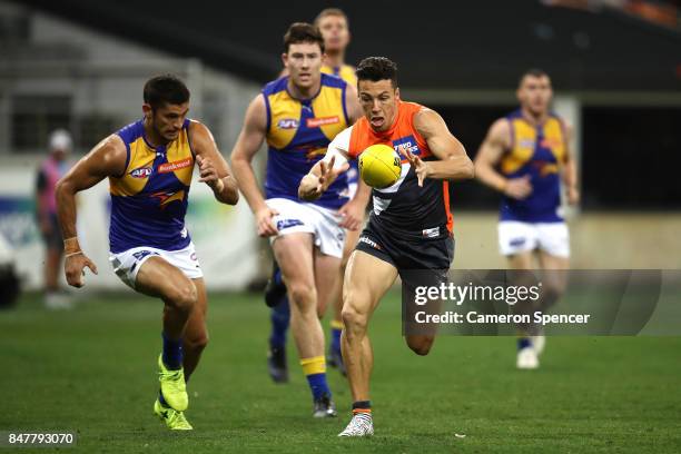 Dylan Shiel of the Giants runs the ball during the AFL First Semi Final match between the Greater Western Sydney Giants and the West Coast Eagles at...