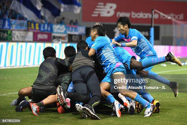 Sagan Tosu players celebrate their team's second goal scored by Kim Min Hyeok during the J.League J1 match between Sagan Tosu and Ventforet Kofu at...