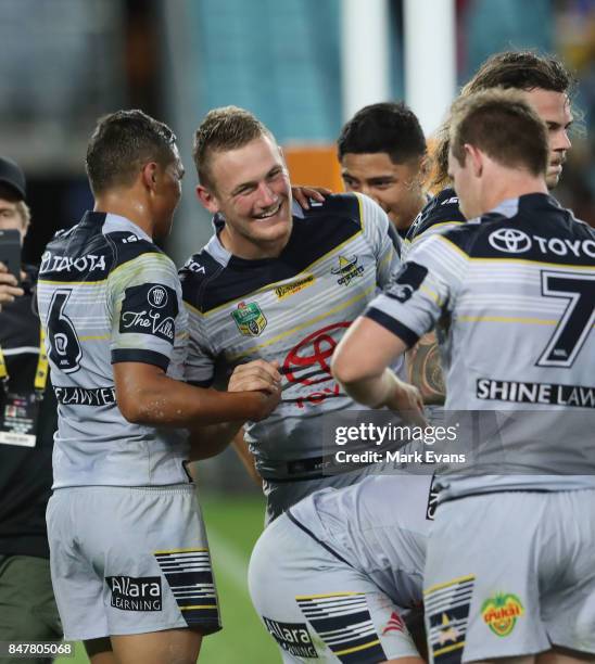 Cowboys players celebrate their win during the NRL Semi Final match between the Parramatta Eels and the North Queensland Cowboys at ANZ Stadium on...