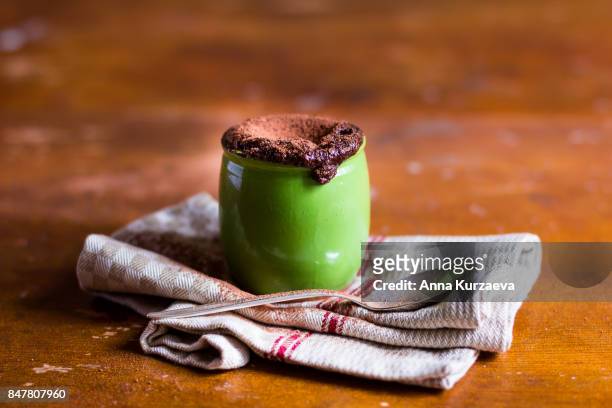 homemade chocolate souffle with cocoa powder in a jar, selective focus - chocolate souffle stock pictures, royalty-free photos & images