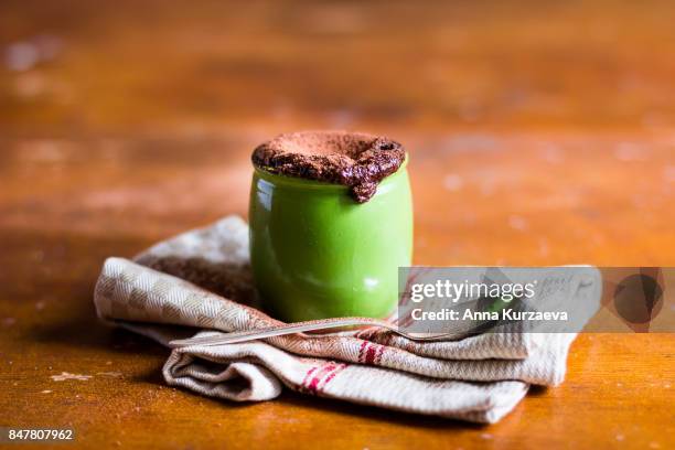 homemade chocolate souffle with cocoa powder in a jar, selective focus - chocolate souffle stock pictures, royalty-free photos & images