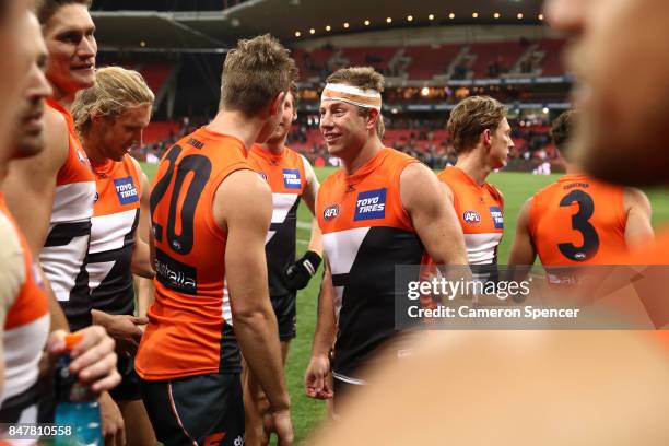 Steve Johnson of the Giants thanks fans and celebrates winning the AFL First Semi Final match between the Greater Western Sydney Giants and the West...