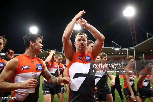 Steve Johnson of the Giants thanks fans and celebrates winning the AFL First Semi Final match between the Greater Western Sydney Giants and the West...