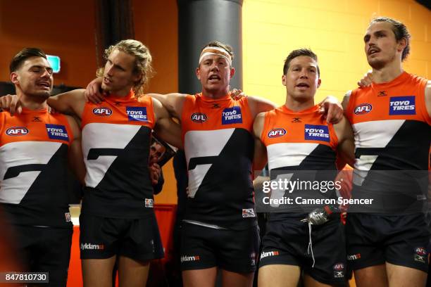 Steve Johnson of the Giants and team mates sing their team song after winning the AFL First Semi Final match between the Greater Western Sydney...