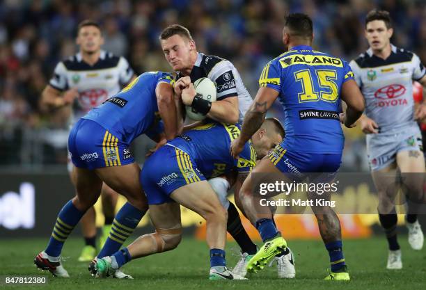 Coen Hess of the Cowboys is tackled during the NRL Semi Final match between the Parramatta Eels and the North Queensland Cowboys at ANZ Stadium on...