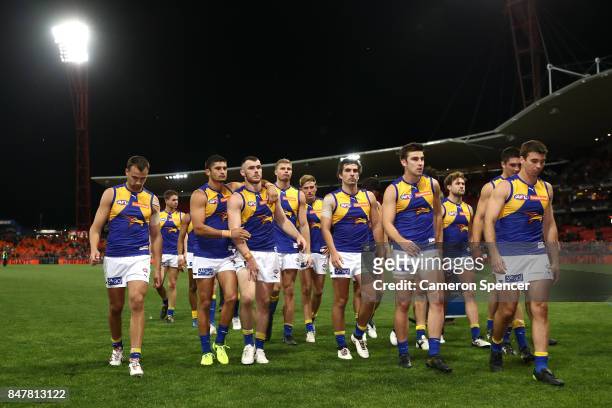 Eagles players leave the field after losing the AFL First Semi Final match between the Greater Western Sydney Giants and the West Coast Eagles at...