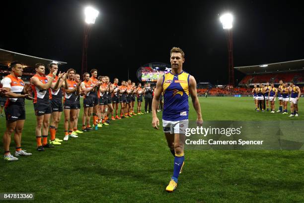 Sam Mitchell of the Eagles is clapped off the field after playing his last match during the AFL First Semi Final match between the Greater Western...