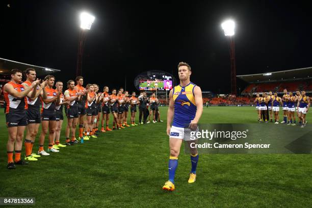 Sam Mitchell of the Eagles is clapped off the field after playing his last match during the AFL First Semi Final match between the Greater Western...