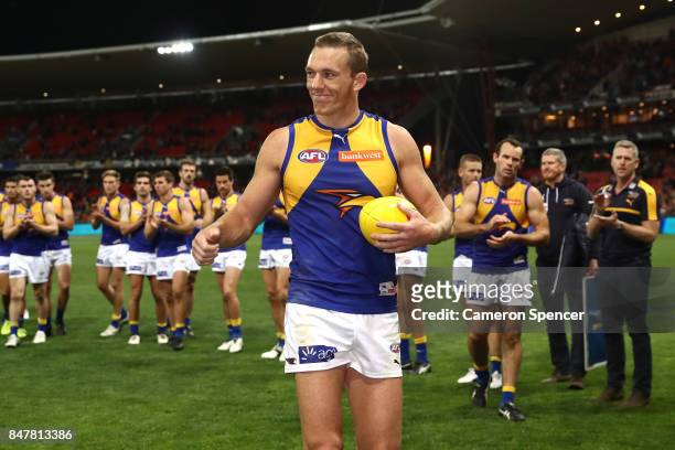 Drew Petrie of the Eagles is clapped off the field after playing his last match during the AFL First Semi Final match between the Greater Western...