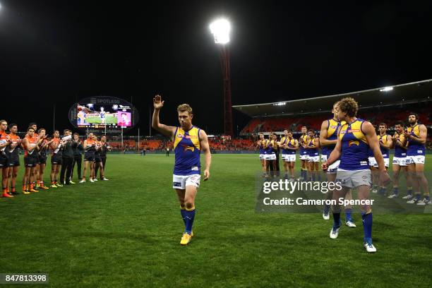 Sam Mitchell of the Eagles is clapped off the field after playing his last match during the AFL First Semi Final match between the Greater Western...