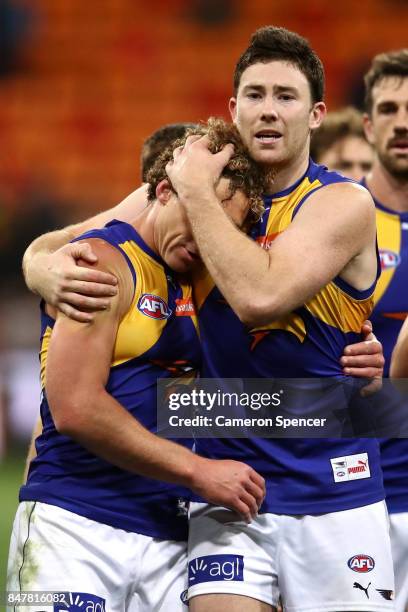 Jeremy McGovern of the Eagles embraces Matt Priddis of the Eagles after playing his last match during the AFL First Semi Final match between the...