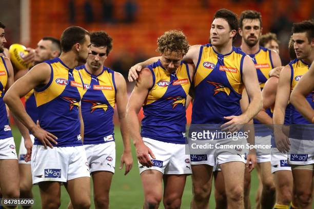 Jeremy McGovern of the Eagles embraces Matt Priddis of the Eagles after playing his last match during the AFL First Semi Final match between the...
