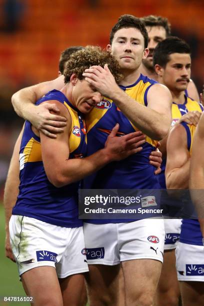 Jeremy McGovern of the Eagles embraces Matt Priddis of the Eagles after playing his last match during the AFL First Semi Final match between the...