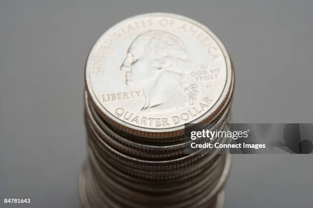 Stack Of Quarters Photos and Premium High Res Pictures - Getty Images
