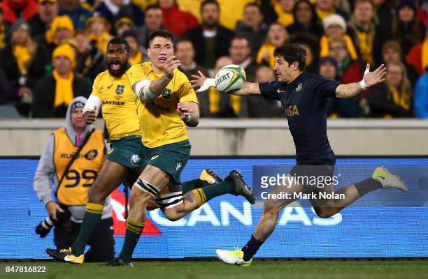 Sean McMahon of the Wallabies offloads during The Rugby Championship match between the Australian Wallabies and the Argentina Pumas at Canberra...