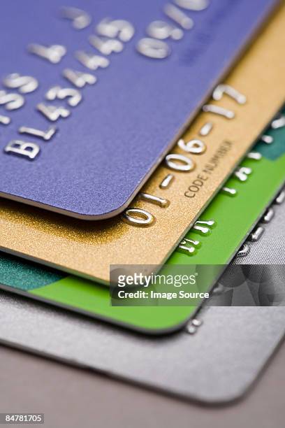 credit cards - credit card and stapel stockfoto's en -beelden