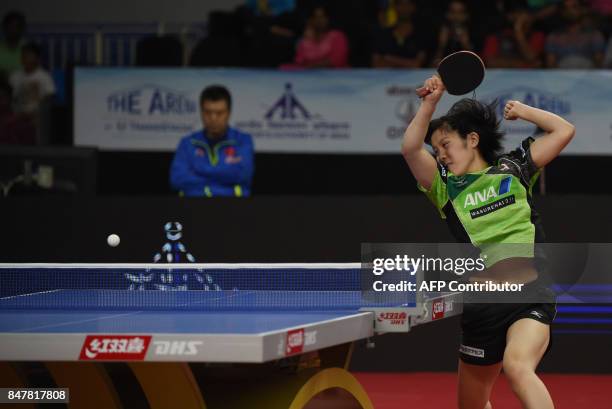 Japan's Hirano Miu plays a shot against China's Zhu Yuling in the Women's Singles semi-finals during the 30th Asian Table Tennis Cup 2017 in...