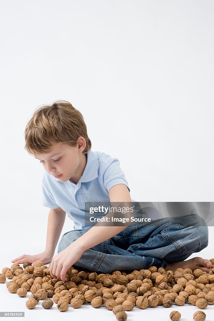 Boy with walnuts