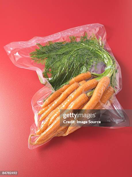 vacuum packed carrots - vakuumförpackad bildbanksfoton och bilder