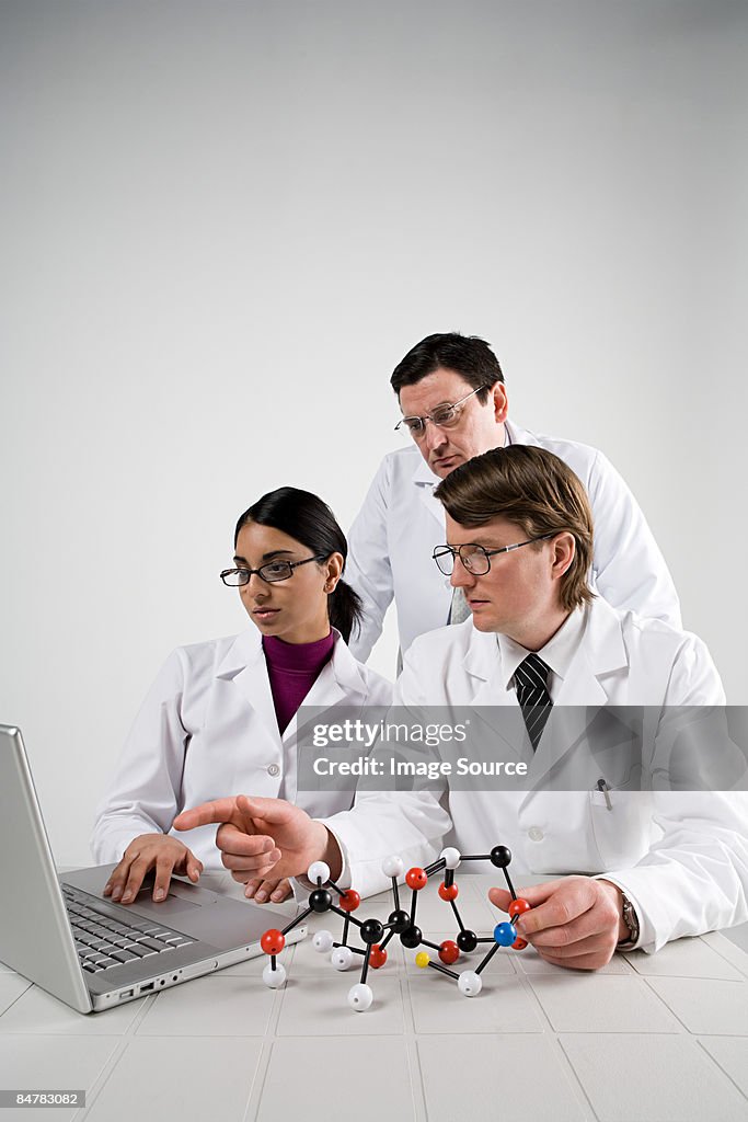 Scientists with laptop