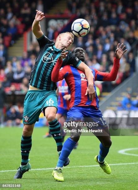 James Ward-Prowse of Southampton and Jeffrey Schlupp of Crystal Palace battle for possession during the Premier League match between Crystal Palace...