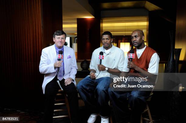 Joe Johnson of the Atlanta Hawks speaks to Craig Sager and Gary Payton during NBA All-Star Media Availability as part of the 2009 NBA All-Star...