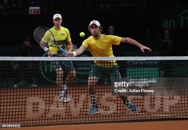 John Peers and Jordan Thompson of Australia in action in the doubles match against Ruben Bemelmans and Arthur De Greef of Belgium during day two of...