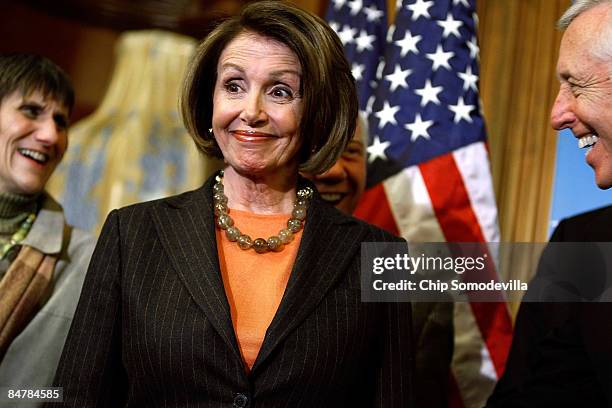 Speaker of the House Nancy Pelosi smiles during a news conference with House Majority Leader Steny Hoyer and Rep. Rosa DeLauro in the U.S. Capitol...