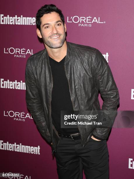 Tom Ellis arrives at Entertainment Weekly's 2017 Pre-Emmy Party held at Sunset Tower Hotel on September 15, 2017 in West Hollywood, California.