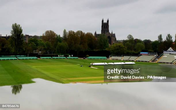 Flood water encroaches on to the outfield at New Road in Worcester, the home of Worcestershire County Cricket Club.
