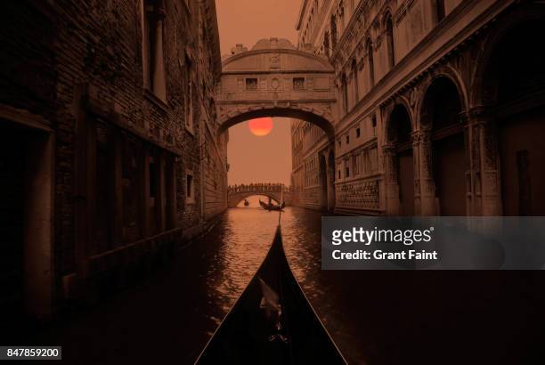 view of famous bridge way above canal at sunset. - venice italy canal stock pictures, royalty-free photos & images