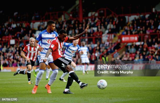 Josh Clarke of Brentford scores his teams first goal during the Sky Bet Championship match between Brentford and Reading at Griffin Park on September...