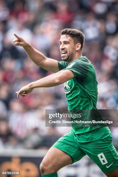 Rani Khedira of Augsburg celebrates a goal during the Bundesliga match between Eintracht Frankfurt and FC Augsburg at Commerzbank-Arena on September...